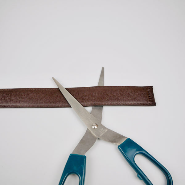 Klipp bältet till rätt längd